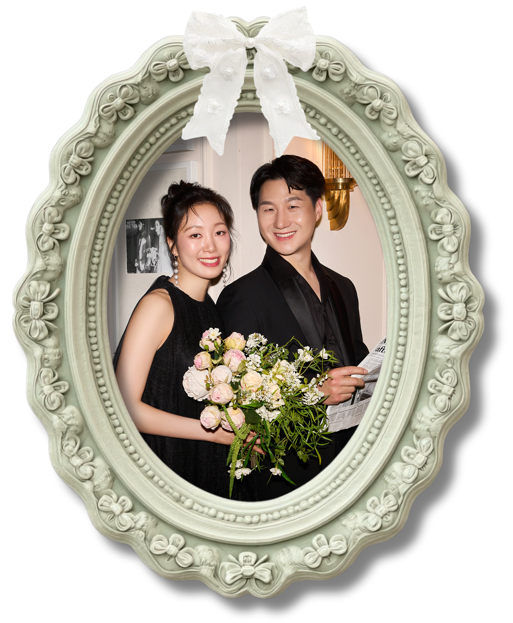 Joyce and Jason in an ornate sage oval frame with a white lace bow